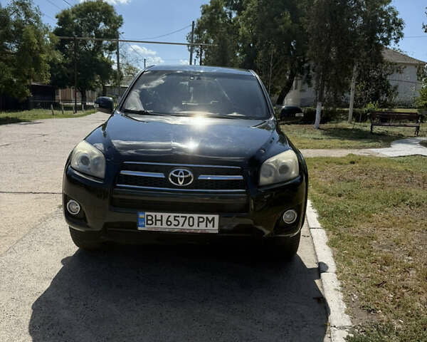 Черный Тойота РАВ 4, объемом двигателя 2.23 л и пробегом 275 тыс. км за 10000 $, фото 1 на Automoto.ua