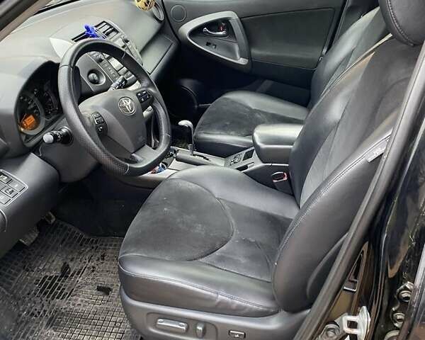 Черный Тойота РАВ 4, объемом двигателя 2 л и пробегом 224 тыс. км за 12500 $, фото 1 на Automoto.ua