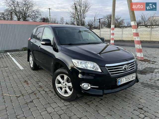 Черный Тойота РАВ 4, объемом двигателя 1.99 л и пробегом 120 тыс. км за 14900 $, фото 1 на Automoto.ua