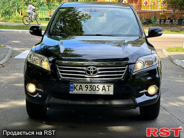 Чорний Тойота РАВ 4, об'ємом двигуна 2 л та пробігом 140 тис. км за 11500 $, фото 1 на Automoto.ua