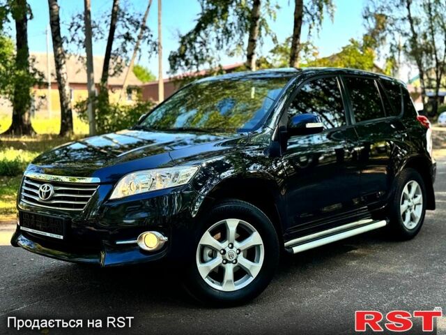 Черный Тойота РАВ 4, объемом двигателя 2 л и пробегом 152 тыс. км за 12100 $, фото 1 на Automoto.ua