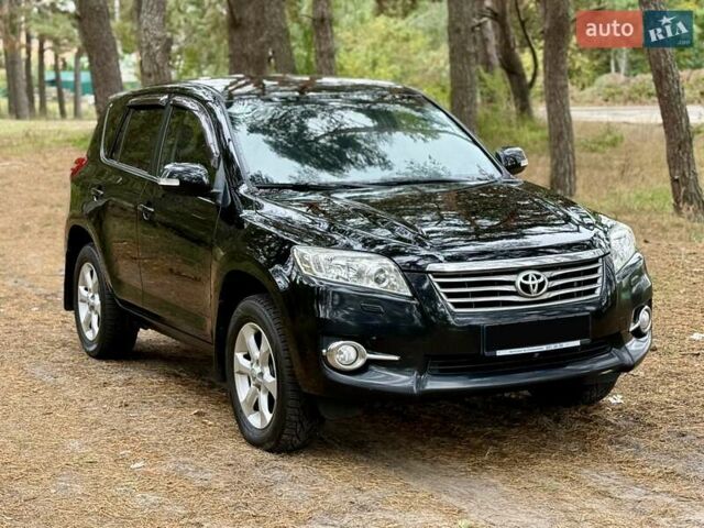 Чорний Тойота РАВ 4, об'ємом двигуна 2 л та пробігом 153 тис. км за 12900 $, фото 1 на Automoto.ua