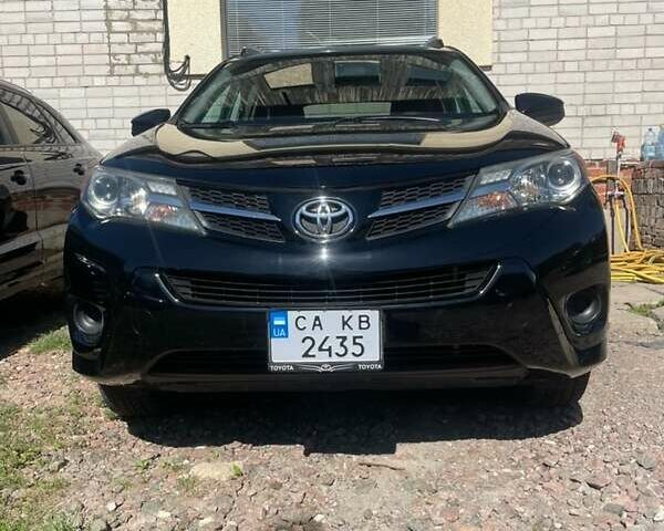 Черный Тойота РАВ 4, объемом двигателя 2.49 л и пробегом 142 тыс. км за 15000 $, фото 1 на Automoto.ua