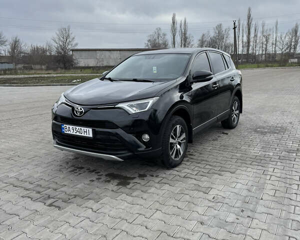 Чорний Тойота РАВ 4, об'ємом двигуна 2 л та пробігом 371 тис. км за 14755 $, фото 1 на Automoto.ua