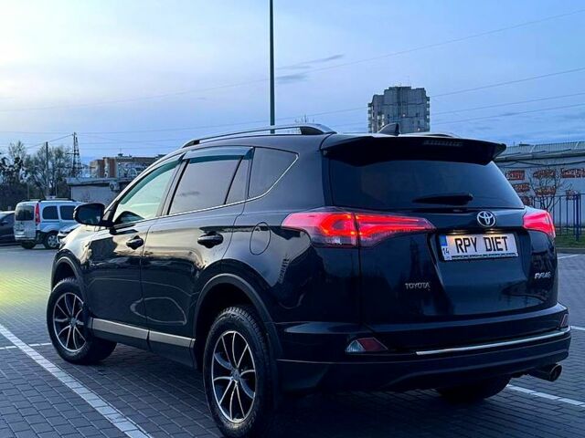 Черный Тойота РАВ 4, объемом двигателя 2 л и пробегом 95 тыс. км за 19000 $, фото 1 на Automoto.ua