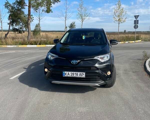 Черный Тойота РАВ 4, объемом двигателя 2.5 л и пробегом 122 тыс. км за 26000 $, фото 1 на Automoto.ua