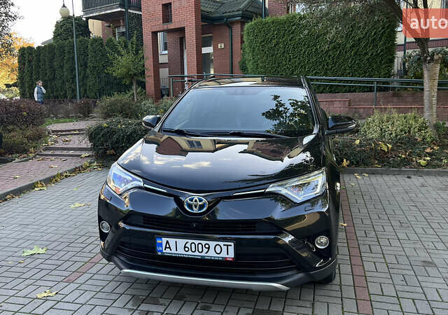 Черный Тойота РАВ 4, объемом двигателя 2.5 л и пробегом 190 тыс. км за 21000 $, фото 1 на Automoto.ua