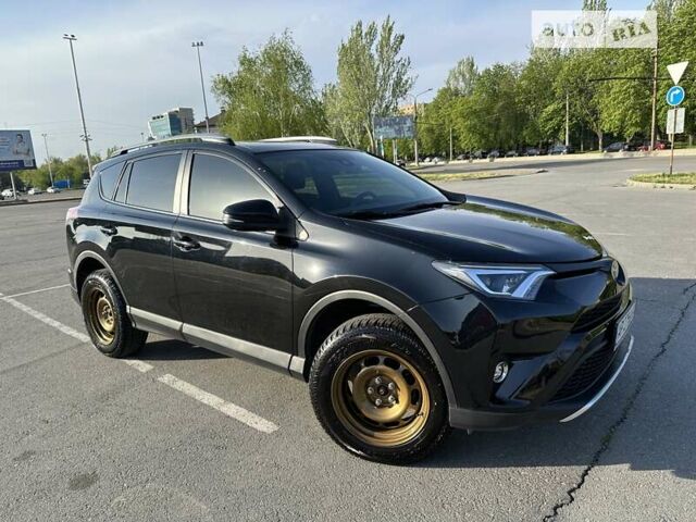 Черный Тойота РАВ 4, объемом двигателя 2.49 л и пробегом 115 тыс. км за 17300 $, фото 1 на Automoto.ua