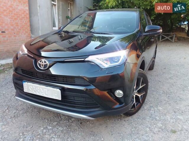 Чорний Тойота РАВ 4, об'ємом двигуна 1.99 л та пробігом 150 тис. км за 20700 $, фото 1 на Automoto.ua