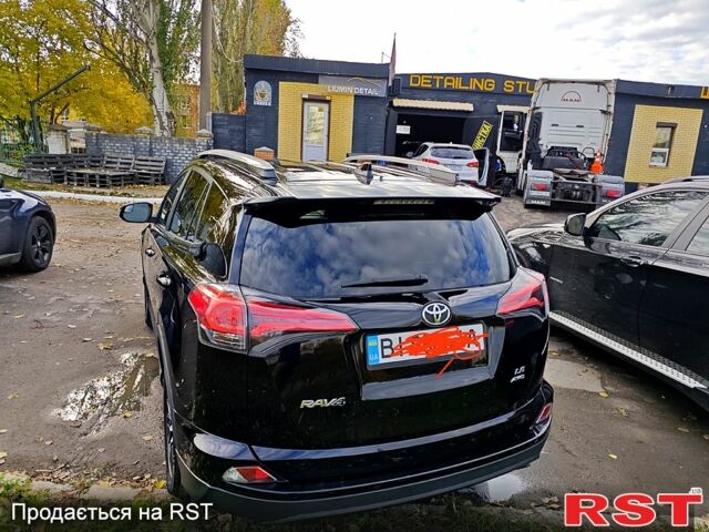 Черный Тойота РАВ 4, объемом двигателя 2.5 л и пробегом 128 тыс. км за 23000 $, фото 1 на Automoto.ua