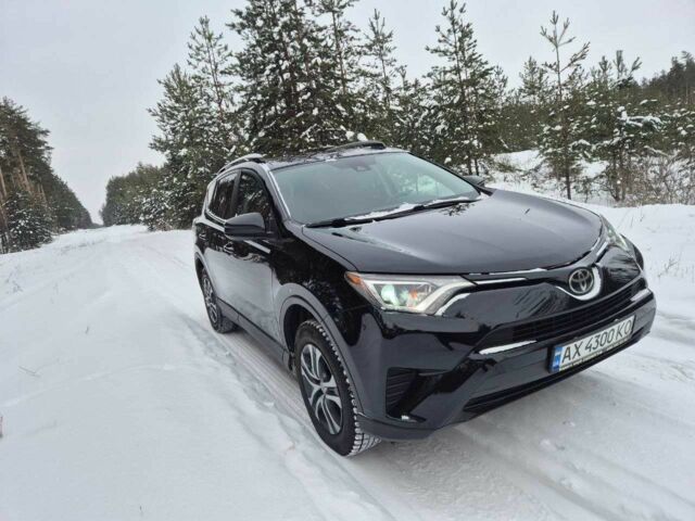 Черный Тойота РАВ 4, объемом двигателя 2.5 л и пробегом 102 тыс. км за 18000 $, фото 1 на Automoto.ua