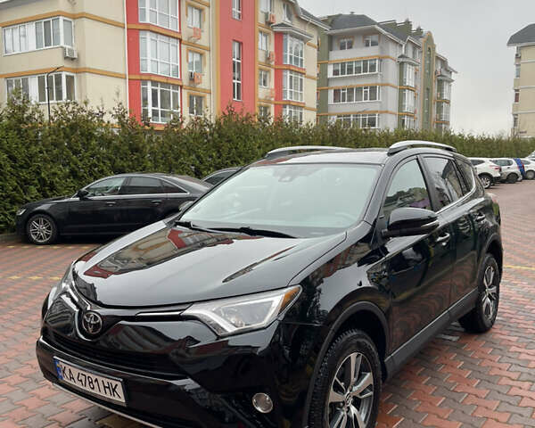 Черный Тойота РАВ 4, объемом двигателя 2.49 л и пробегом 98 тыс. км за 22000 $, фото 1 на Automoto.ua