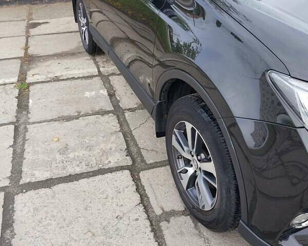 Коричневый Тойота РАВ 4, объемом двигателя 2 л и пробегом 124 тыс. км за 18000 $, фото 1 на Automoto.ua