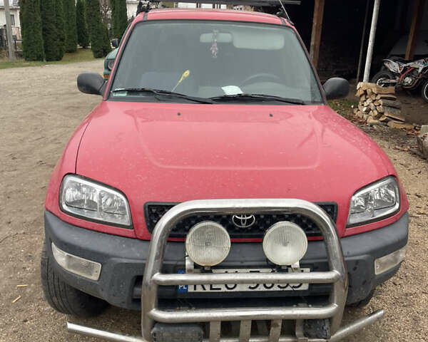Красный Тойота РАВ 4, объемом двигателя 1.99 л и пробегом 270 тыс. км за 2700 $, фото 1 на Automoto.ua