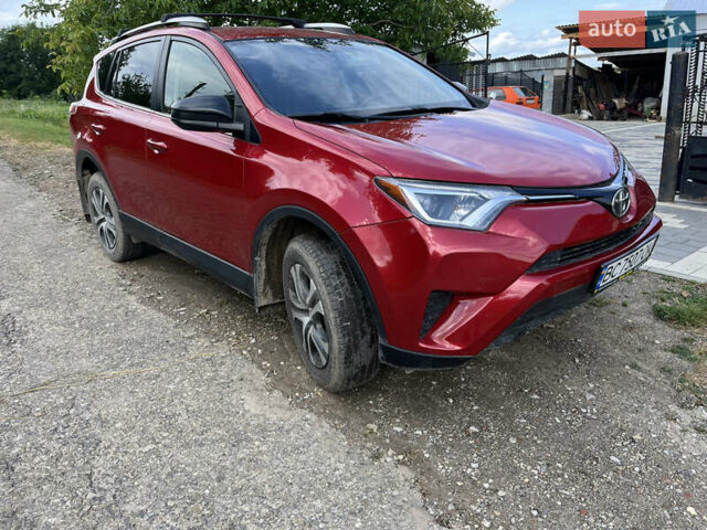 Червоний Тойота РАВ 4, об'ємом двигуна 2.4 л та пробігом 82 тис. км за 18000 $, фото 1 на Automoto.ua