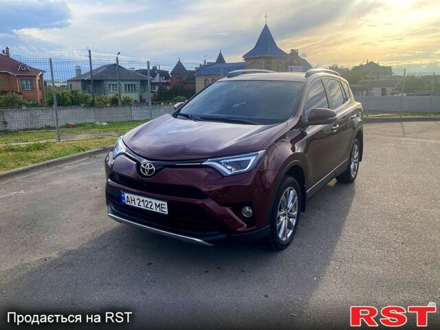 Красный Тойота РАВ 4, объемом двигателя 2.2 л и пробегом 126 тыс. км за 23000 $, фото 1 на Automoto.ua