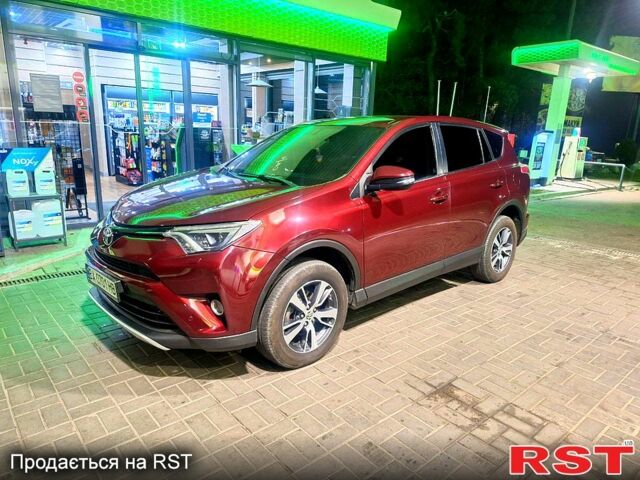 Красный Тойота РАВ 4, объемом двигателя 2.2 л и пробегом 189 тыс. км за 18500 $, фото 1 на Automoto.ua