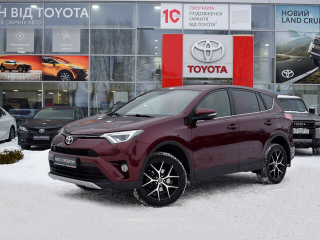 Червоний Тойота РАВ 4, об'ємом двигуна 2 л та пробігом 94 тис. км за 21900 $, фото 1 на Automoto.ua