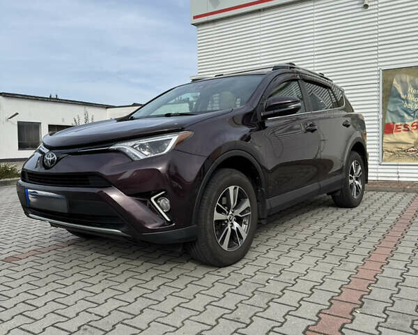 Червоний Тойота РАВ 4, об'ємом двигуна 2.49 л та пробігом 157 тис. км за 21200 $, фото 1 на Automoto.ua
