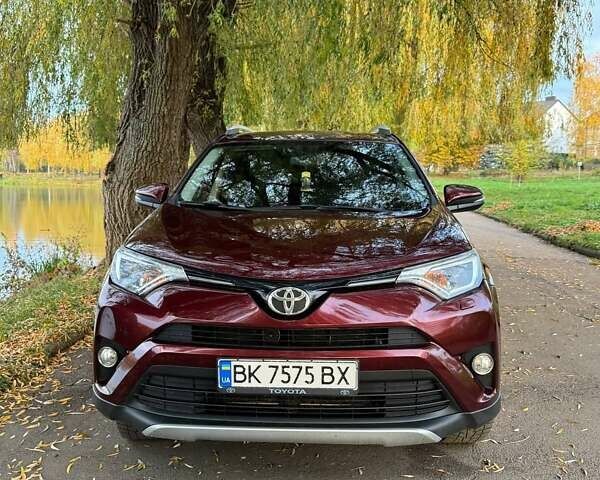 Красный Тойота РАВ 4, объемом двигателя 1.99 л и пробегом 218 тыс. км за 19300 $, фото 1 на Automoto.ua