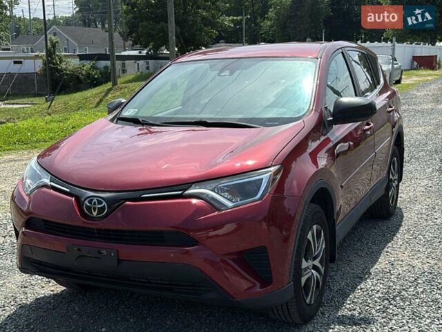Червоний Тойота РАВ 4, об'ємом двигуна 2.49 л та пробігом 225 тис. км за 9600 $, фото 1 на Automoto.ua