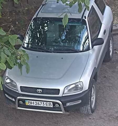 Серый Тойота РАВ 4, объемом двигателя 2 л и пробегом 391 тыс. км за 5250 $, фото 1 на Automoto.ua
