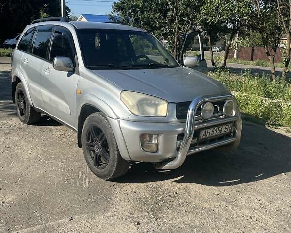 Серый Тойота РАВ 4, объемом двигателя 2 л и пробегом 400 тыс. км за 6000 $, фото 1 на Automoto.ua