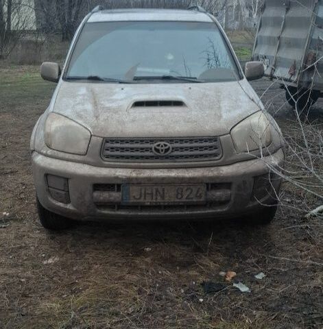 Серый Тойота РАВ 4, объемом двигателя 2 л и пробегом 400 тыс. км за 3600 $, фото 1 на Automoto.ua