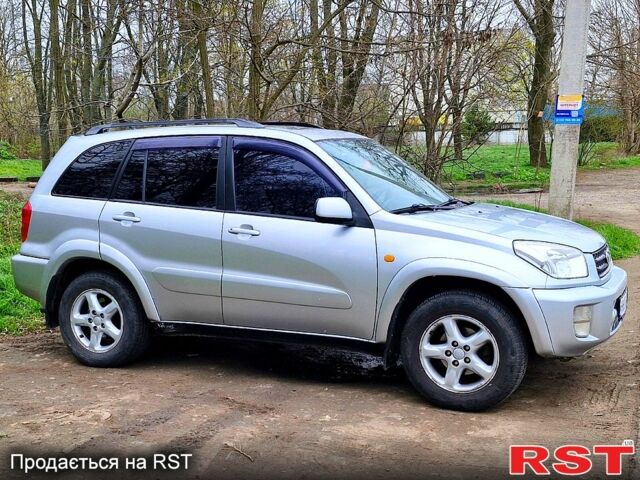 Серый Тойота РАВ 4, объемом двигателя 2 л и пробегом 300 тыс. км за 6500 $, фото 1 на Automoto.ua