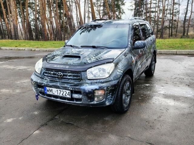 Серый Тойота РАВ 4, объемом двигателя 2 л и пробегом 290 тыс. км за 3050 $, фото 1 на Automoto.ua