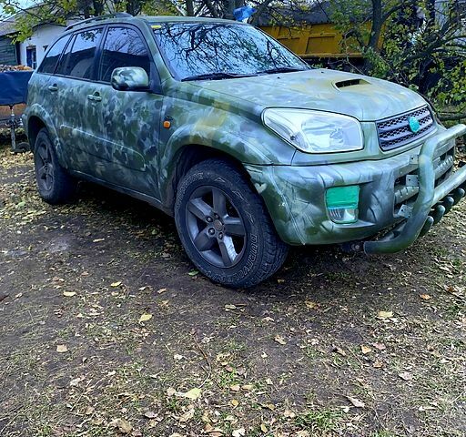 Сірий Тойота РАВ 4, об'ємом двигуна 20 л та пробігом 255 тис. км за 5300 $, фото 1 на Automoto.ua