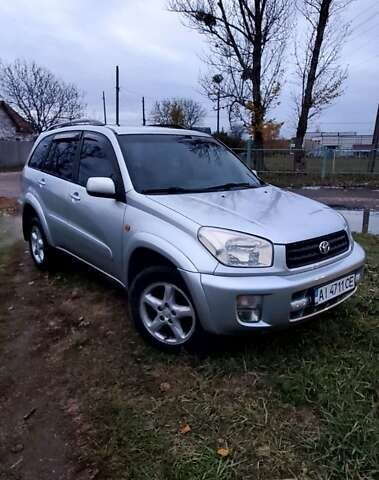 Серый Тойота РАВ 4, объемом двигателя 2 л и пробегом 325 тыс. км за 5999 $, фото 1 на Automoto.ua