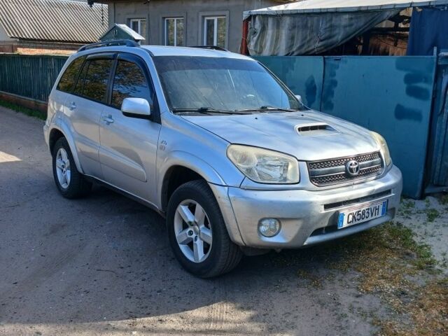 Серый Тойота РАВ 4, объемом двигателя 2 л и пробегом 200 тыс. км за 5000 $, фото 1 на Automoto.ua
