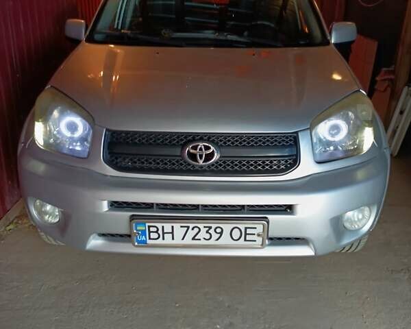 Серый Тойота РАВ 4, объемом двигателя 2 л и пробегом 220 тыс. км за 6700 $, фото 1 на Automoto.ua