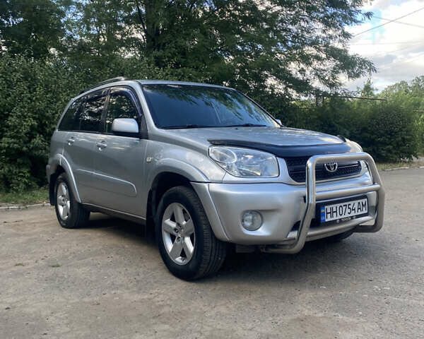Сірий Тойота РАВ 4, об'ємом двигуна 2 л та пробігом 295 тис. км за 7199 $, фото 1 на Automoto.ua