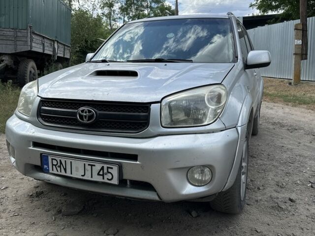 Сірий Тойота РАВ 4, об'ємом двигуна 2 л та пробігом 268 тис. км за 3002 $, фото 1 на Automoto.ua