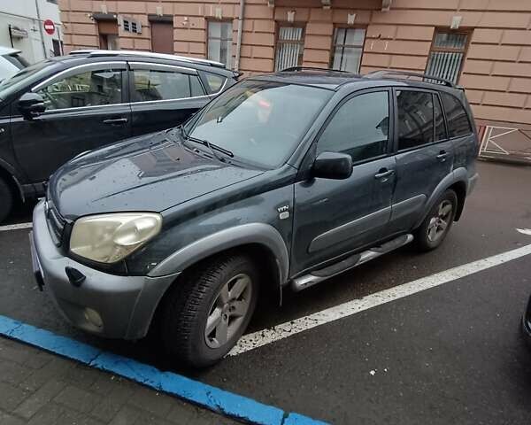 Серый Тойота РАВ 4, объемом двигателя 2 л и пробегом 209 тыс. км за 6700 $, фото 1 на Automoto.ua