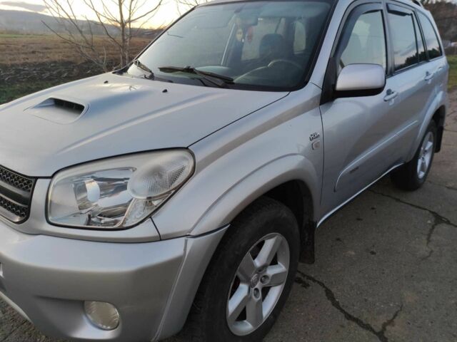 Серый Тойота РАВ 4, объемом двигателя 2 л и пробегом 320 тыс. км за 3800 $, фото 1 на Automoto.ua