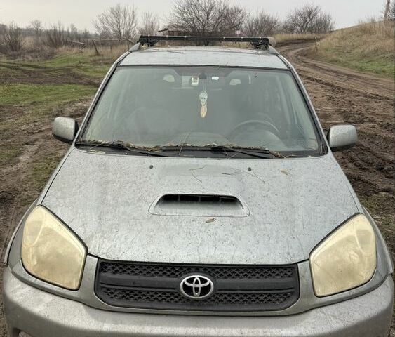 Серый Тойота РАВ 4, объемом двигателя 2 л и пробегом 365 тыс. км за 3500 $, фото 1 на Automoto.ua