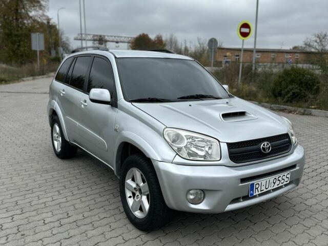 Серый Тойота РАВ 4, объемом двигателя 2 л и пробегом 390 тыс. км за 3850 $, фото 1 на Automoto.ua