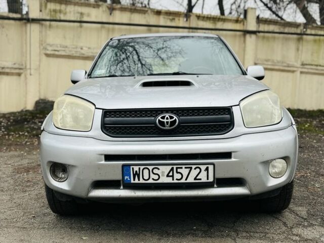 Серый Тойота РАВ 4, объемом двигателя 2 л и пробегом 318 тыс. км за 3800 $, фото 1 на Automoto.ua