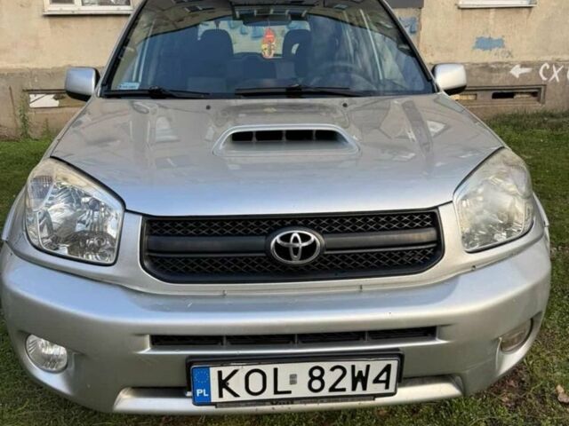 Серый Тойота РАВ 4, объемом двигателя 2 л и пробегом 366 тыс. км за 3500 $, фото 1 на Automoto.ua