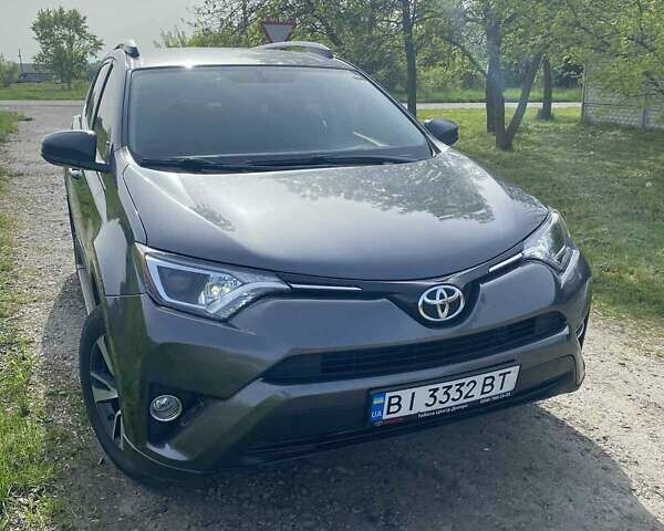Серый Тойота РАВ 4, объемом двигателя 2.49 л и пробегом 190 тыс. км за 16100 $, фото 1 на Automoto.ua