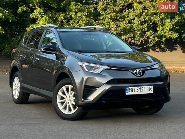 Сірий Тойота РАВ 4, об'ємом двигуна 2.49 л та пробігом 117 тис. км за 14800 $, фото 1 на Automoto.ua