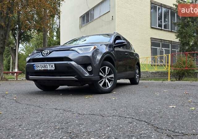Серый Тойота РАВ 4, объемом двигателя 2.49 л и пробегом 160 тыс. км за 16500 $, фото 1 на Automoto.ua