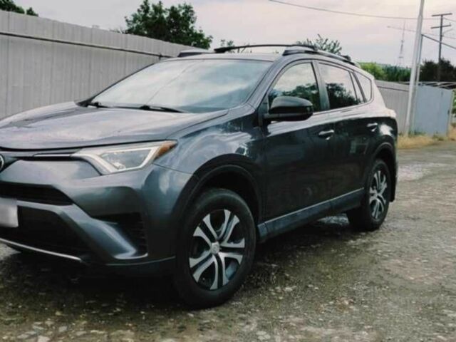 Сірий Тойота РАВ 4, об'ємом двигуна 2.5 л та пробігом 98 тис. км за 11800 $, фото 1 на Automoto.ua