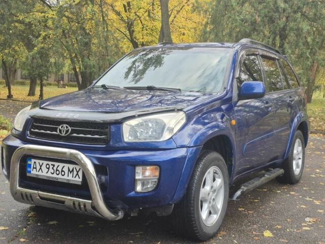 Синій Тойота РАВ 4, об'ємом двигуна 2 л та пробігом 230 тис. км за 5999 $, фото 1 на Automoto.ua
