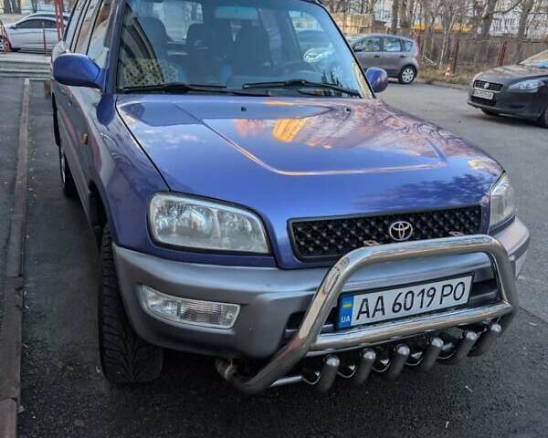 Синий Тойота РАВ 4, объемом двигателя 2 л и пробегом 286 тыс. км за 4500 $, фото 1 на Automoto.ua