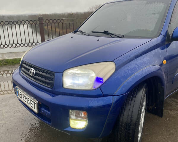Синій Тойота РАВ 4, об'ємом двигуна 2 л та пробігом 244 тис. км за 6800 $, фото 1 на Automoto.ua