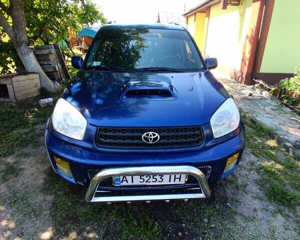 Синий Тойота РАВ 4, объемом двигателя 2 л и пробегом 373 тыс. км за 6500 $, фото 1 на Automoto.ua
